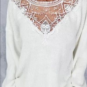 Brand new lace accented sweater.